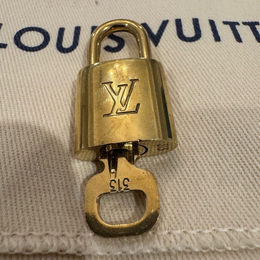 Louis Vuitton Shiny Gold Padlock and Key Set